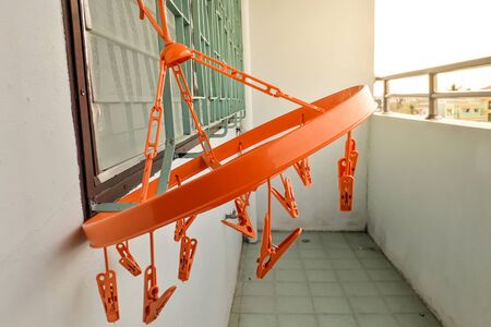 Clip square Clothes Hanger and Clothes hangers at the outdoor area in room.の写真素材