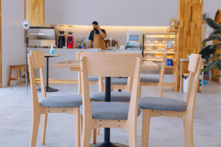 Coffee shops with tables are empty by noon.の写真素材
