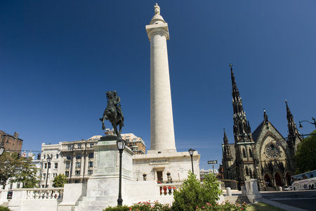 Photo of the George Washington Monument, Statue of La Fayette, and the United Methodist Church in...