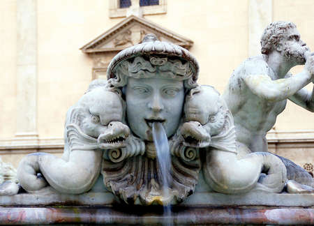 The Moor Fountain, located in the southern area of Piazza Navona, takes its name from the group of sculptures of the tank representing an Ethiopian fighting with a dolphin.の写真素材