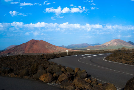 empty road in lanzarote vulcanic rock の写真素材
