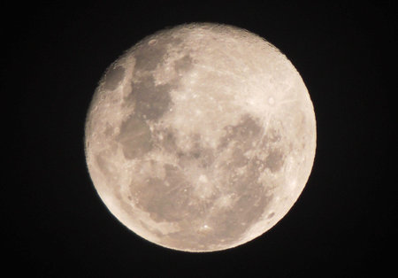 close-up of the moon craters and black background With