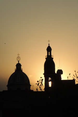 cupolas of churches in a golden sunset backlightingの写真素材