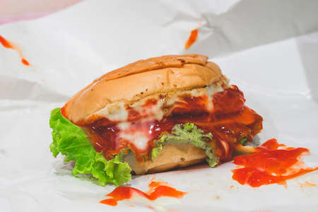 Hamburger and red sauce, street food that is easy to buyの写真素材