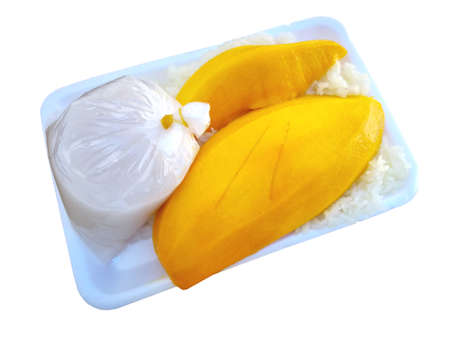 Mango and sticky rice, Thai sweets in a foam packageの写真素材