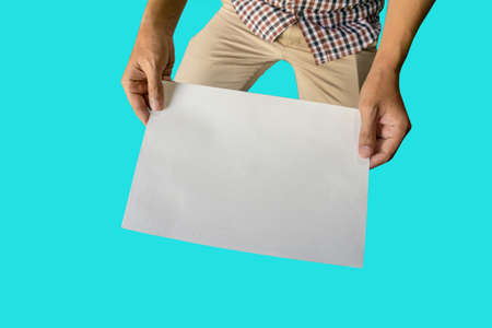 White blank paper holder, sitting holding documents on a blue backgroundの写真素材