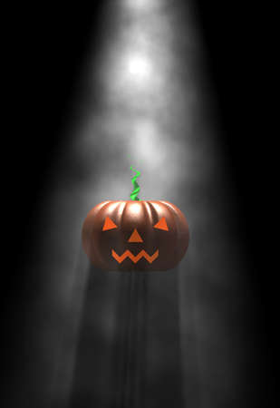 Halloween pumpkin, in fog lightの写真素材