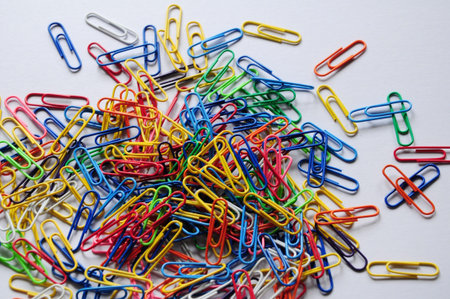 Image of some used colorful paper clipsの写真素材