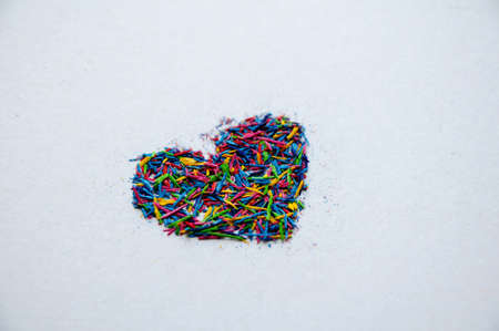 Color pencil shaving on white background の写真素材