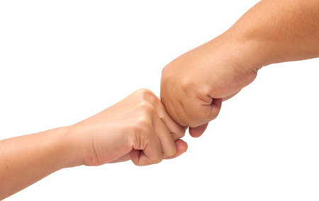 Hand with clenched a fist of two womanの写真素材