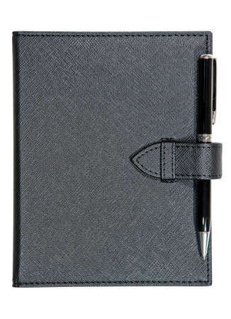 Black leather notebook and pen isolated on white backgroundの写真素材