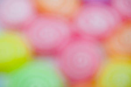 Colorful jelly fruits on abstract background blurの写真素材