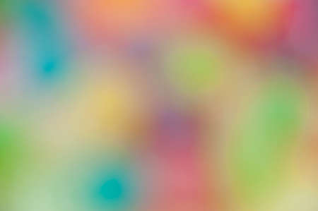 Colorful mix jelly fruits on abstract background blurの写真素材
