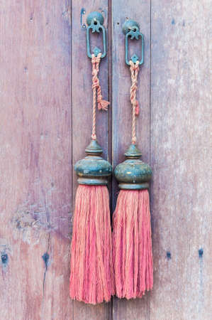 Old wood door with decorative knockerの写真素材