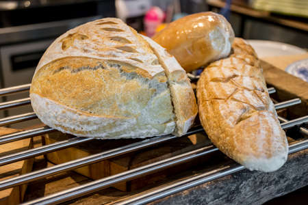 Fresh french bread on the grill in bakery shop. Selective focusの写真素材