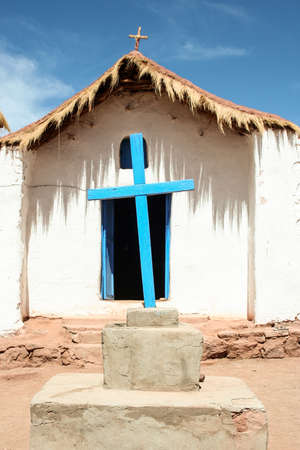 blue cross, white houseの写真素材