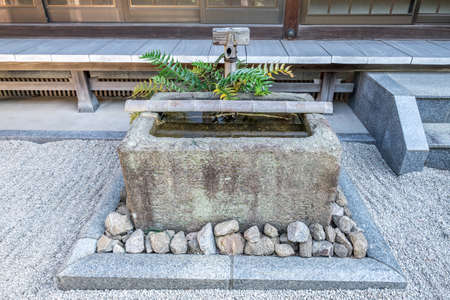 A Japanese stone water basin in Kyoto templeの写真素材