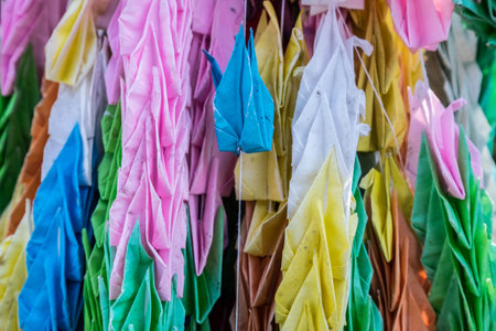 Colourful origami chain found in the peace museum in Nagasakiの写真素材