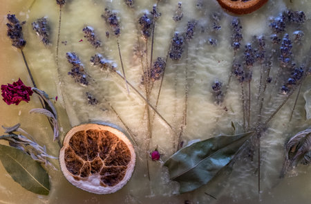 Fancy soap imbued with lavendar and orangesの写真素材
