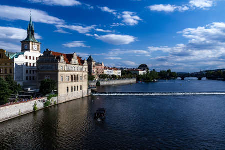 A sunny day in central prague overlooking the riverの写真素材