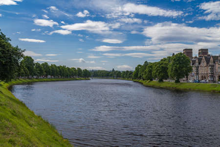 A riverside view of the city of Inverness, Scotlandの写真素材