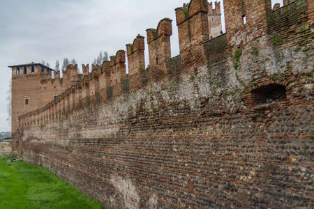 The old wall of Verona, Italy during a cloudy dayの写真素材