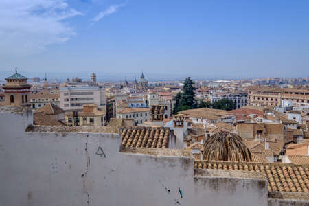 Granada cityscape behind a diagonal wallの写真素材