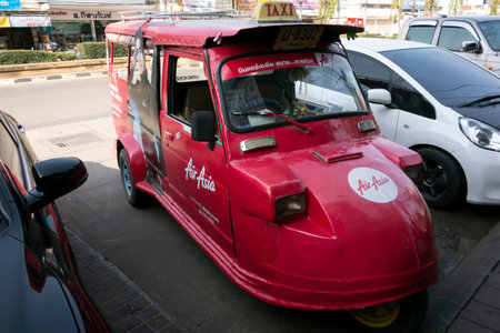 Various Forms Of Airline Airasia in Phitsanulok of Thailand EDITORIALPhitsanulok, Thailand - February 2, 2015: Taxi on the Street in Cityのeditorial素材