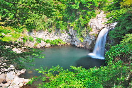 Majestic waterfall in the wilderness in Koreaの写真素材