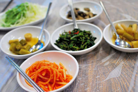 Traditional vegetarian Korean cuisine served in small dishesの写真素材