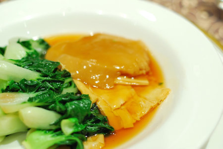 Sumptuous and healthy-looking Asian style vegetarian cuisine. Cooked with green, leafy vegetables...