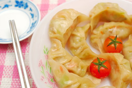Sumptuous looking Chinese style traditional vegetarian dumplings. Suitable for concepts such as diet and nutrition, healthy eating and healthy lifestyle, and food and beverage.の写真素材