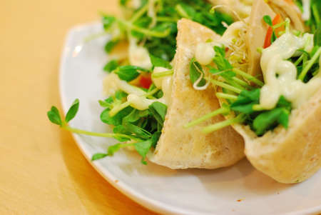 Sumptuous looking vegetarian sandwich with a variety of raw vegetables. の写真素材