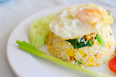 Healthy Thai style vegetarian pineapple fried rice. Suitable for concepts such as diet and nutrition, healthy lifestyle, and food and beverage.の写真素材