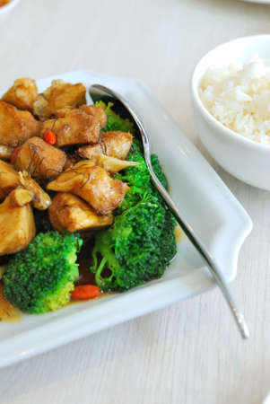Sumptuous looking Chinese vegetarian mock meat made from monkey head mushrooms with green broccoli. Suitable for concepts such as diet and nutrition, healthy lifestyle, and food and beverage.の写真素材