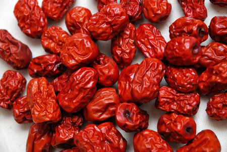 Chinese traditional medicine ingredient, red dates. For concepts such as food and beverage, healthy lifestyle, and diet and nutrition.の写真素材