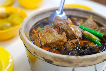 Delicious Chinese vegetarian claypot delicacy known as monkey head mushrooms. Suitable for concepts such as diet and nutrition, healthy eating lifestyle, and food and beverage.の写真素材