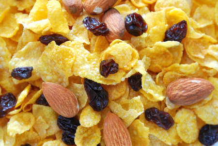 Cereal with raisins and nuts for a nutritious and healthy breakfast or meal. Also for healthy eating and lifestyle, diet and nutrition, and food and beverage concepts.の写真素材