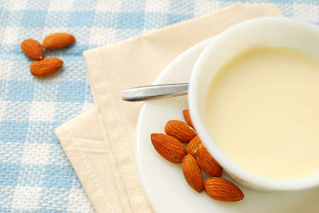 Top view of nutritious almond drink with almond seeds. Almond is used in Chinese desserts and cuisine. For food and beverage, and diet and nutrition concepts.の写真素材