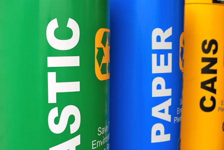 Colorful recycle bins for recyclable materials such as plastic, paper and metal. For environmental...