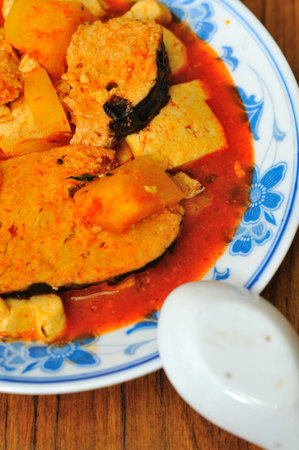 Closeup of steamed and spicy fish prepared with vegetarian ingredients.の写真素材