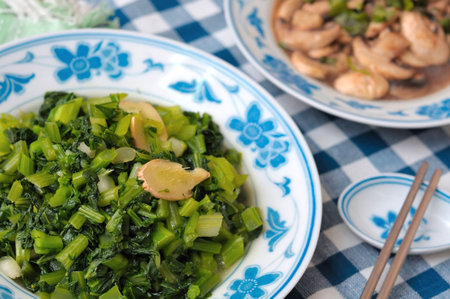 Healthy green leafy vegetables cooked Asian style.