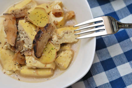Asian mushroom and tofu dish ready to eat.の写真素材