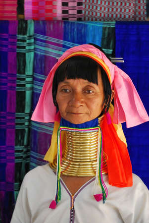 Portrait of elderly long necked Karen tribeswoman in traditional costume.のeditorial素材