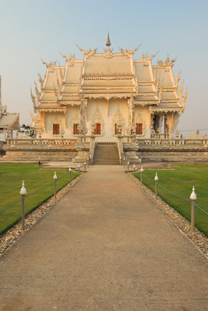 Road leading to grand looking Southeast Asian architecture. Portrait orientation.の写真素材