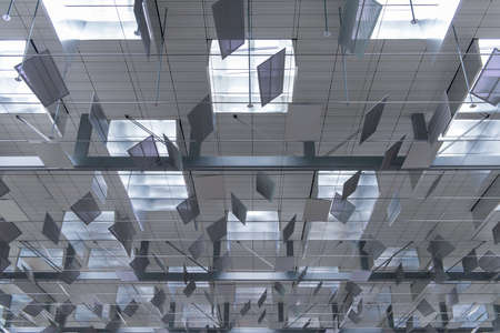 Metallic patterns in ceiling design to let sunlight through.の写真素材