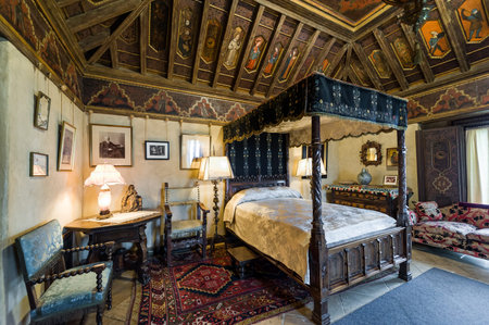 California, USA, 09 Jun 2013: Beautiful and luxurious bedroom with intricate carvings and designs at Hearst Castle, which is a National and California Historical Landmark opened for public tours.のeditorial素材