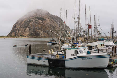 California, USA, 09 Jun 2013: Misty morning at Morro Bay with anchored yachts.のeditorial素材