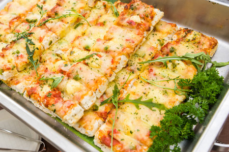 Delicious vegetarian Italian pizza served on tray.