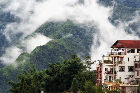 SAPA, VIETNAM - JULY 6: Cluster of buildings on July 6, 2009 in Sapa, Vietnam. Centre of Sapa provides hotels, shoping centers, bars and restaurants for both domestic and international touristsのeditorial素材